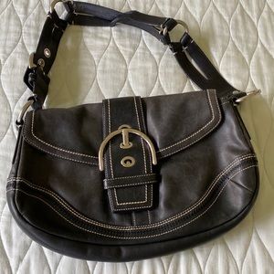 Black buckle Coach bag.  Good condition
